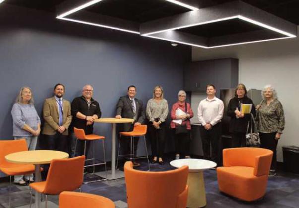 Above are Penta school board members in the student lounge area of the new satellite campus on Corporate Drive in Holland. The board toured the facility following their regular board of education meeting. The building will house the phlebotomy program, among others, and will serve high school students and adult education learners.