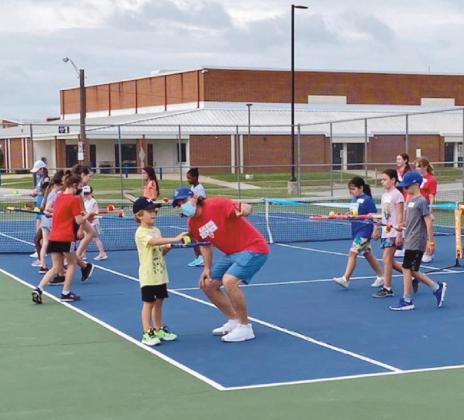 Youth learn skills at SHS tennis camp