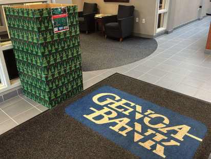 A drop-off box for lights in a Genoa Bank lobby.