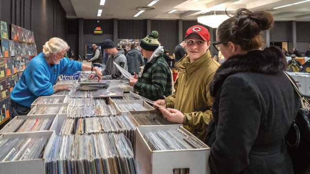 Customers shop during the Febuary 16 Glass City Record Show at the Stranahan Theater and Great Hall. The show returns to the venue on Sunday, August 10. Photo Credit: Doug Hinebaugh