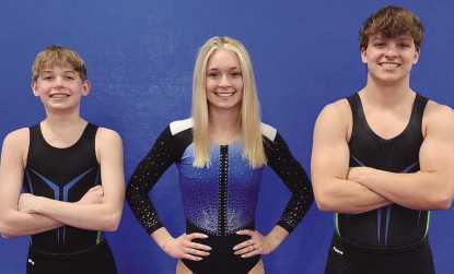 Pictured from left are gymnasts Josh Lankey, Aizlin Westcott and Ryan Lambdin.